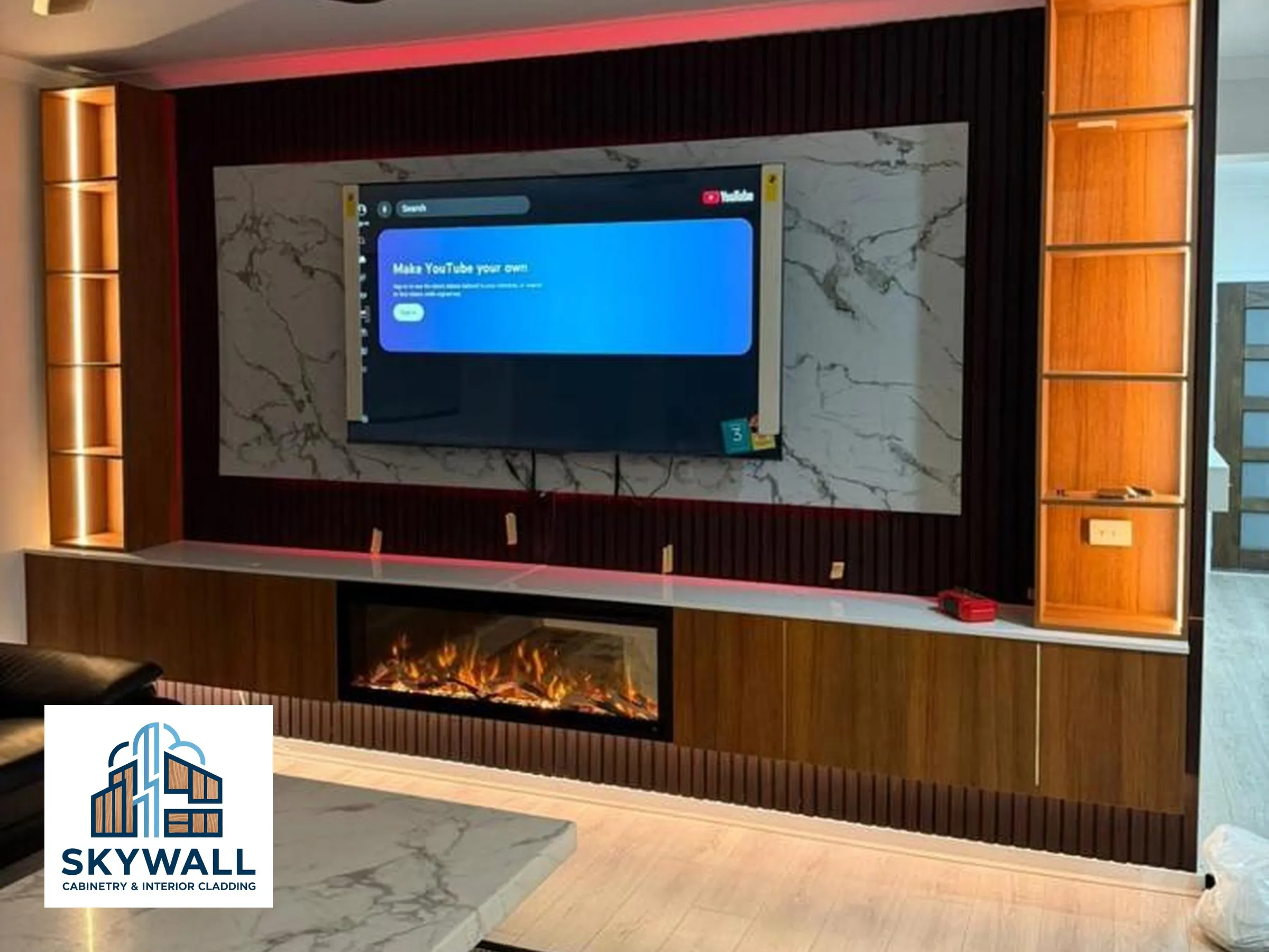 Finished media wall with custom TV cabinetry